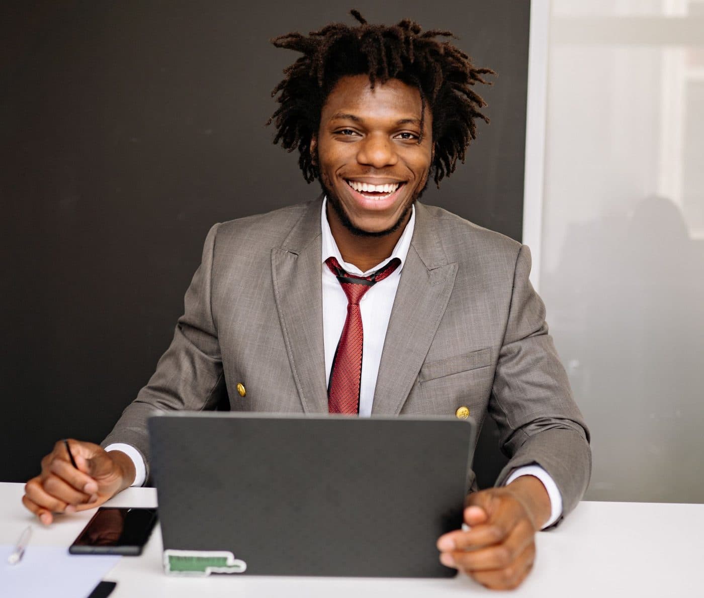 Scrini customer working on a laptop